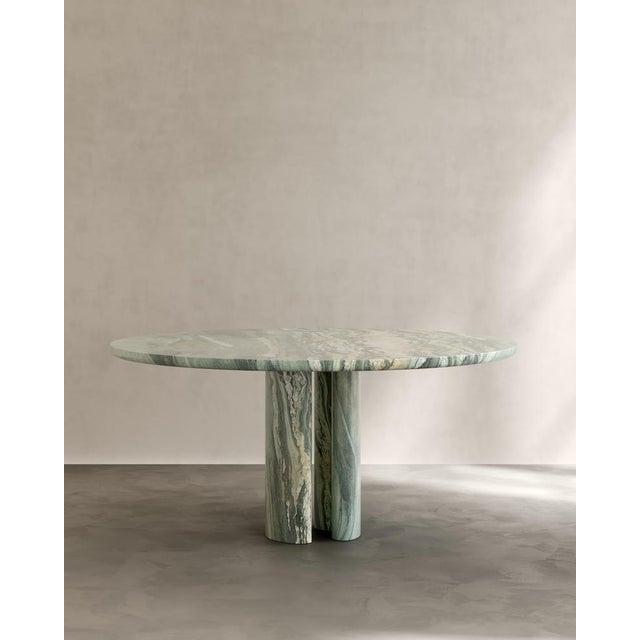 Roman dining table iii in cippolino marble by paloma editions dimensions: d 160 x w 160 x h 75 cm. Materials: marble. The...