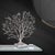 This exceptional work of art captures the delicate intricacies of coral with breathtaking precision, transforming them...