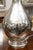 This is an elegant pair of tall mercury glass table lamps featuring elongated bottle-form silhouettes with slender ribbed...