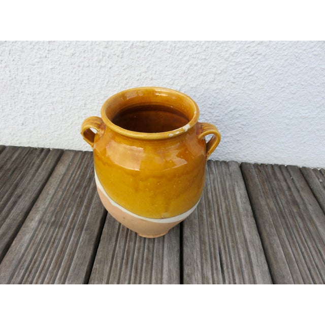 Traditional preserve pot from southwest France, early 20th century. Glazed terracotta. Height 23.5 cm. Width 20 cm. Depth...