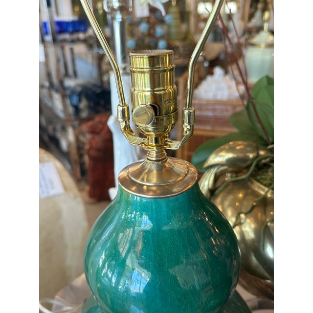 Vintage pair of amazing gourd shape 1960s crackled porcelain glaze green table lamps. Beautiful shades of green...