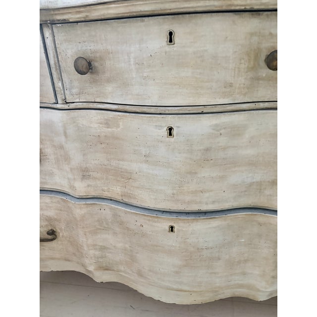 This stunning piece spent decades in a 104-year old shore house! A beautifully sculptural French Provincial commode...