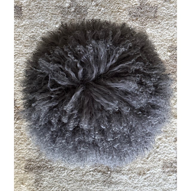 Add a touch of high-end texture to your home with this stunning stool. This isn't your average accent piece—it features a...