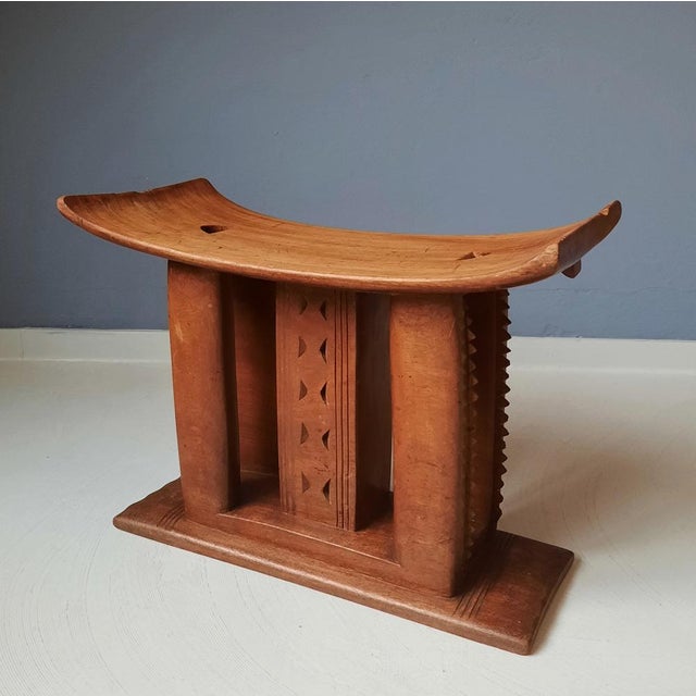 This wooden Asante or Ashanti stool from Ghana is handcrafted. Made out of one piece of wood. Weight: 5 kg.