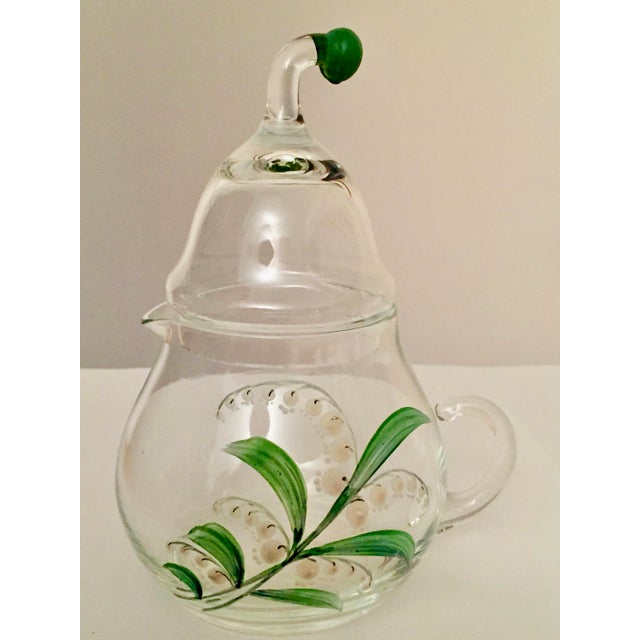 Vintage creamer and sugar set that was most likely a wedding gift right after WW11 in the late 40's. The height of each...