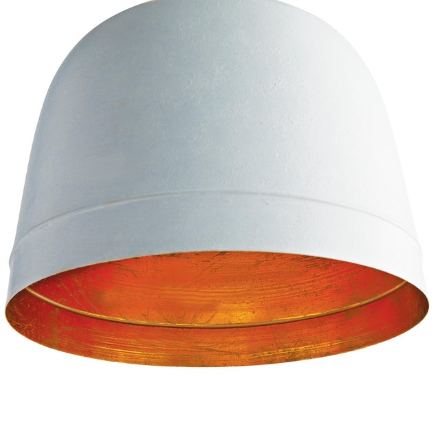 This utterly grandWhite matte pendant withGolden interior lining strikes the perfect balance. And the carved wood detail...