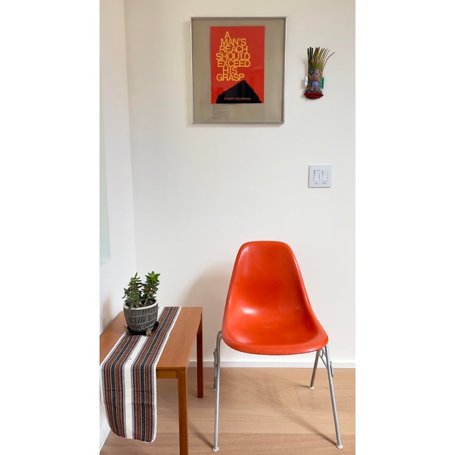 Authentic mid-century Charles & Ray Eames for Herman Miller molded fiberglass side chair on a stacking/ganging base (Model...