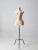This vintage dress form features a metal three footed stand with gold wire wrap accents, combined with a soft, distressed...