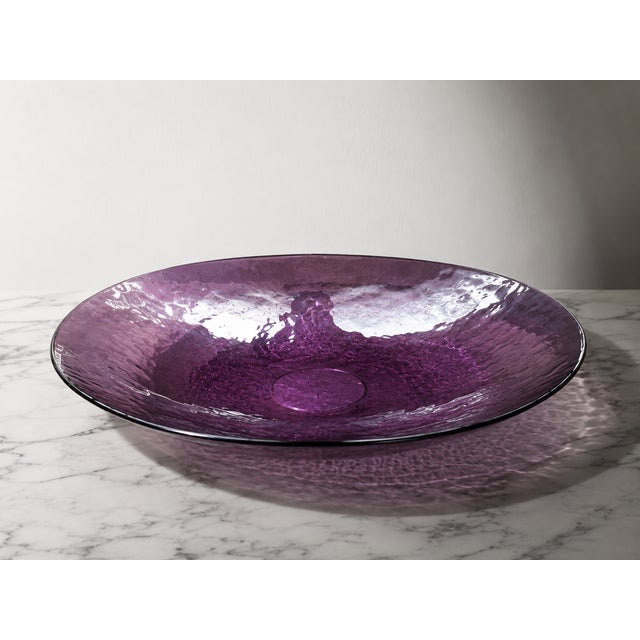 An exceptional and elegant large-scale modernist centerpiece bowl in genuine hand-blown Murano glass, produced by the...