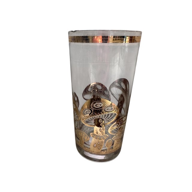 A striking and highly collectible set of six mid-century modern Culver highball glasses, each adorned with a whimsical...