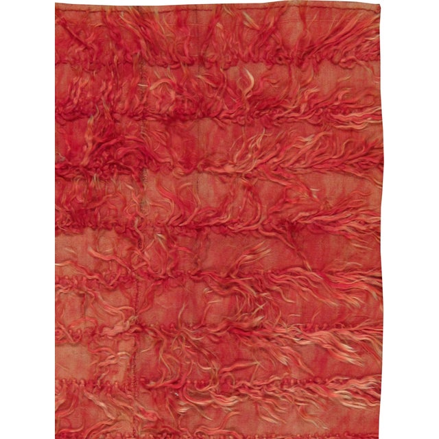 A vintage Turkish Tulu rug. A tribal rug that fits very well with contemporary furniture. All in red with an extra-long...