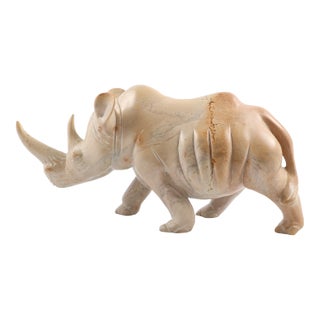 Hand-Carved Stone Rhino Sculpture – Heavy Decorative Animal Figure, Natural Veining For Sale
