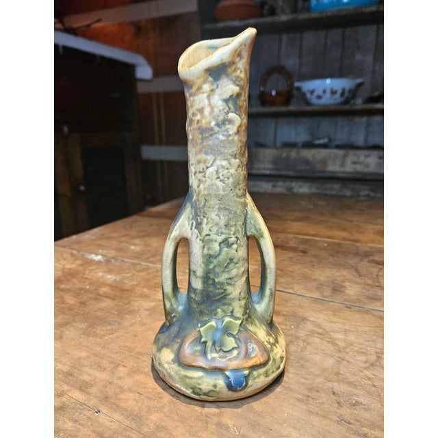 Roseville Imperial Art Pottery Bud Vase is part of an early 20th-century American pottery line known as Roseville Imperial...