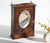 An antique Art Deco style wooden wall cabinet with an oval beveled mirror and nice floral carvings all around. The...