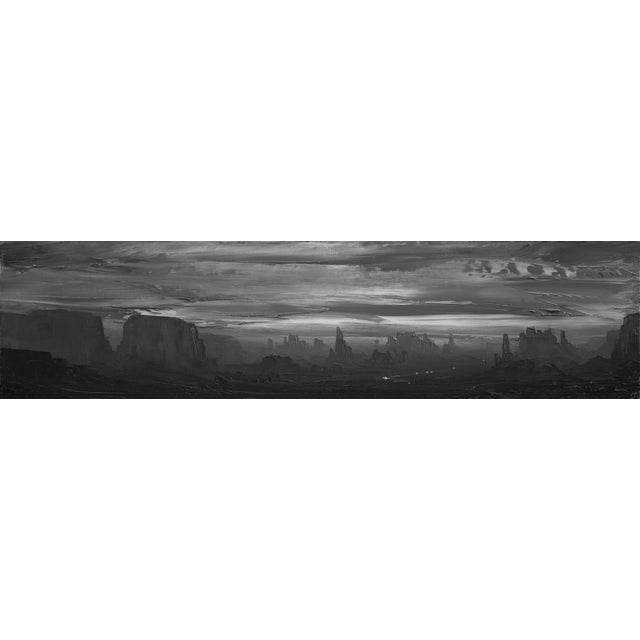 This oil on panel artwork presents a vast, monochromatic landscape where towering rock formations rise against a dramatic...