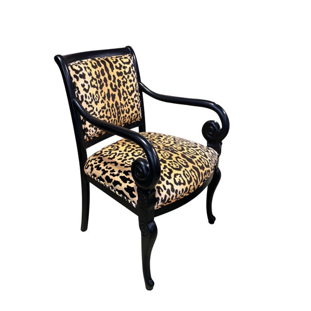 Superb and elegant vintage French Style armchair featuring a solid black lacquer wood frame with newly upholstered animal...