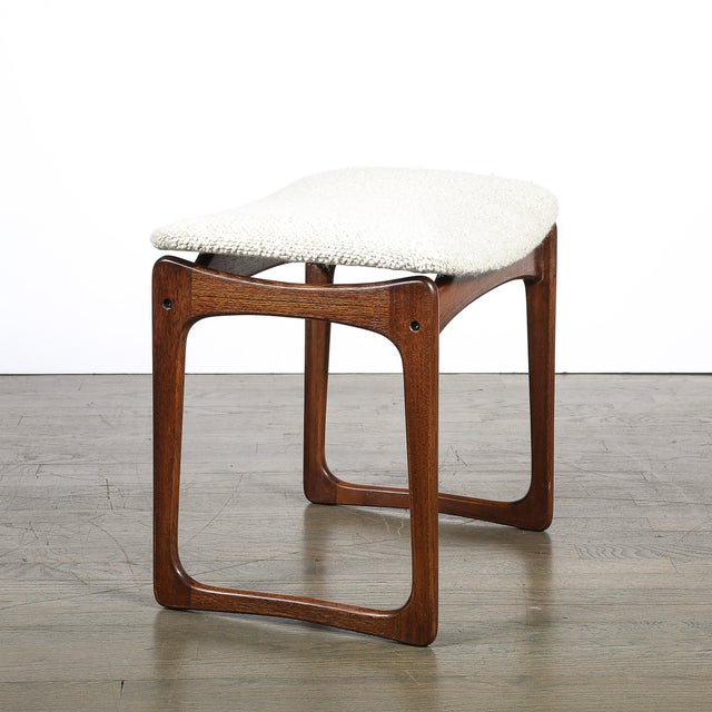 This Mid-Century Modern sculptural stool is a refined example of Danish craftsmanship blended with minimalist elegance....