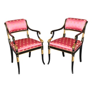 Pair of Hollywood Regency Style Ebonized & Gilt Armchairs by Karges For Sale