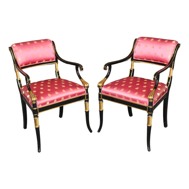 Pair of Hollywood Regency Style Ebonized & Gilt Armchairs by Karges For Sale
