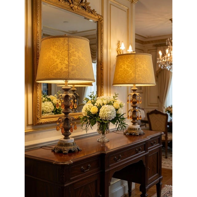 Add instant glamour and tropical elegance to your space with this stunning pair of vintage Hollywood Regency-style table...