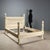 Neo-Renaissance style bed in carved wood from the early 1900s. Four turned and carved columns topped with a carved pine...