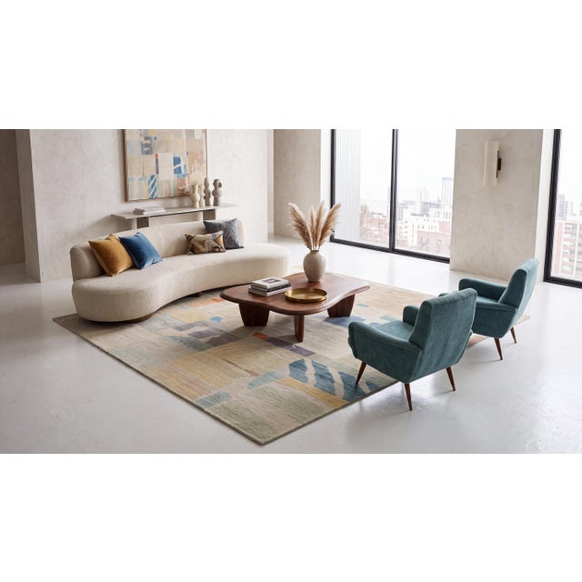 Elevate your interior with this exceptional contemporary hand-knotted wool rug, designed for discerning collector-curated...