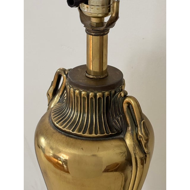 Midcentury Art Nouveau brass lamp with swan handles flanking each side. Please see condition details noted. Most items...