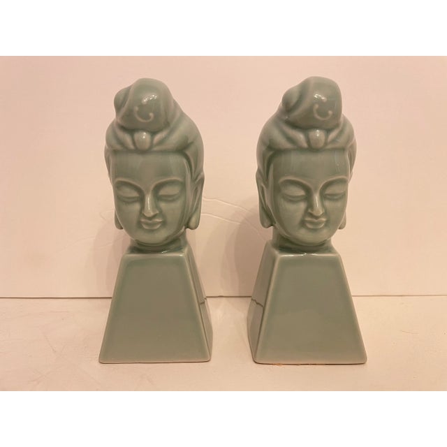 Pair of Ceramic Buddha Sculptures or Bookends. Nicely detailed, in Good condition. Any dark or light spots are reflection...