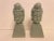 Pair of Ceramic Buddha Sculptures or Bookends. Nicely detailed, in Good condition. Any dark or light spots are reflection...