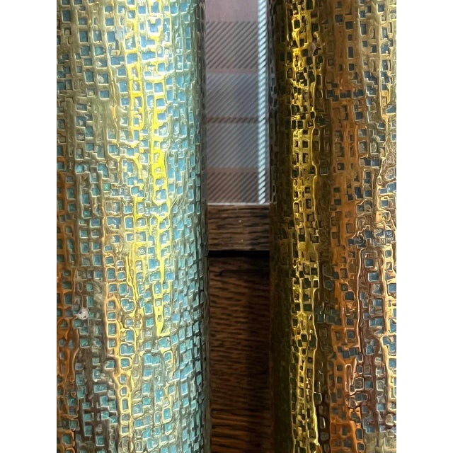 Very Distinctive Design on this pair of WWI Trench Art artillery shells. Not certain what the artist was going for, but...