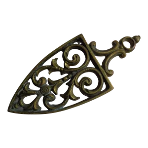 Mid-Century Brass Shield-Shaped Trivet