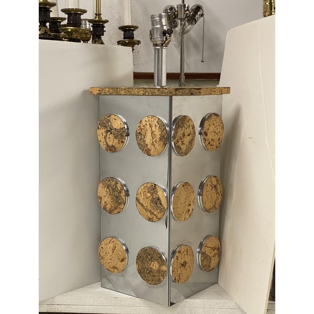 This stylish and chic table lamp dates to the 1970s and is fabricated in cork and polished chrome, in the style of Paul...