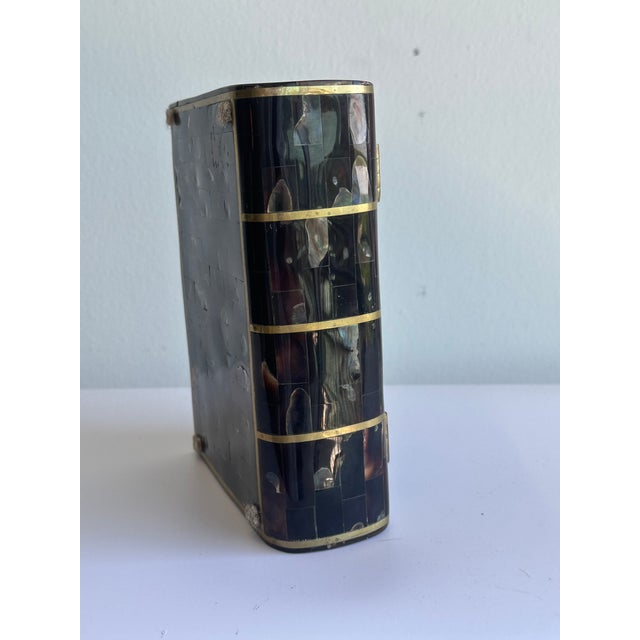 Decorative "Book" Box with Hinged Cover. In the manner of Maitland Smith Box is clad in Beautiful Abalone Shell tiles with...