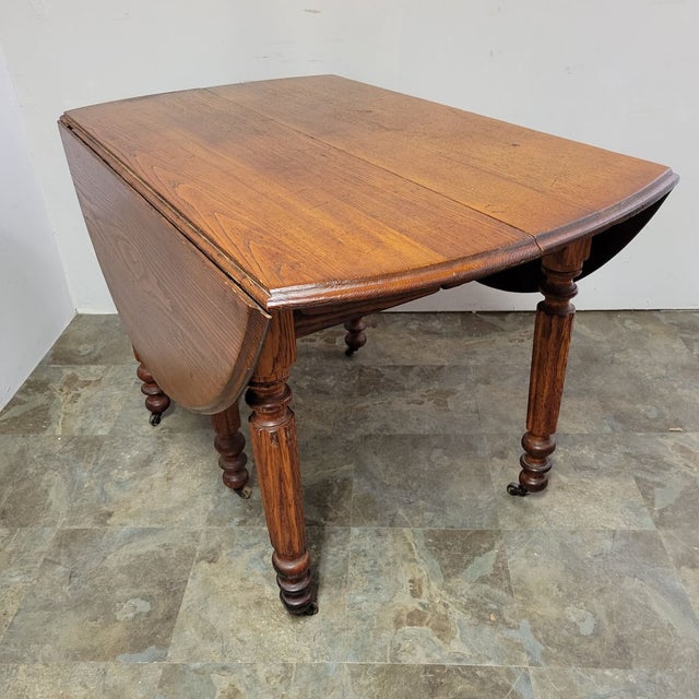 Antique English Chestnut Drop-Leaf Dining Table With Five Turned Legs and Castors, C. 1820–1840 For Sale - Image 10 of 11