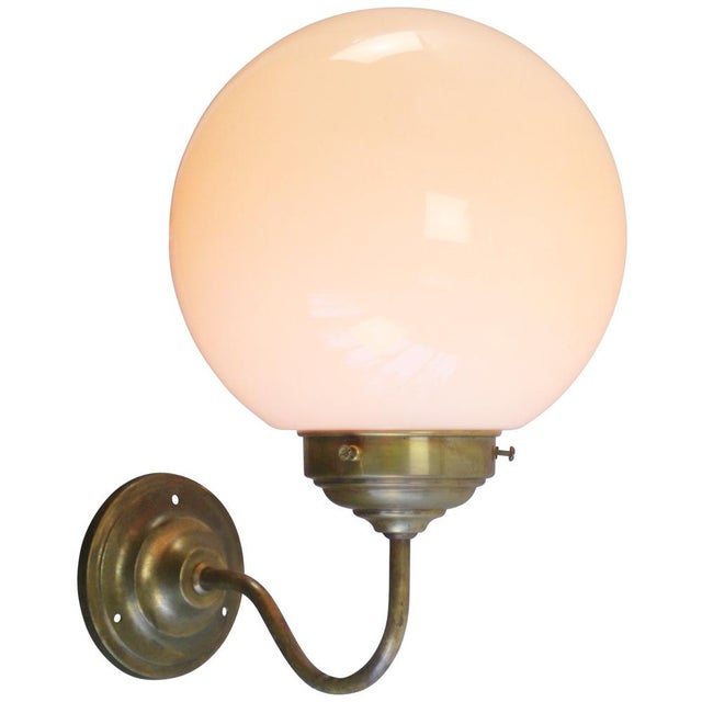 French bistro wall lamp White opaline glass. Brass wall piece and arm diameter brass wall mount: 10 cm, 3 holes to secure...