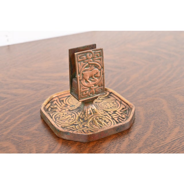A gorgeous antique Arts & Crafts or Art Deco period gilt bronze match box holder featuring symbols of the Zodiac By...