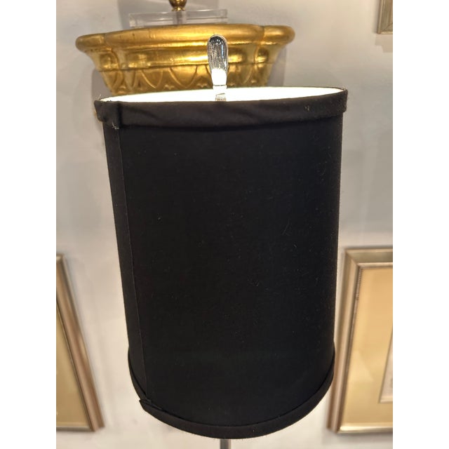 Elegant midcentury modern pair of chrome and marble table lamps having elongated thin chrome columns on white marble cube...