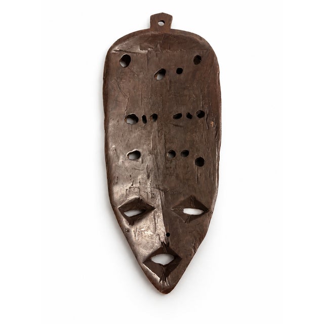 Authentic hand-carved African wooden wall mask crafted by skilled artisans in Malawi. This unique sculpture features...