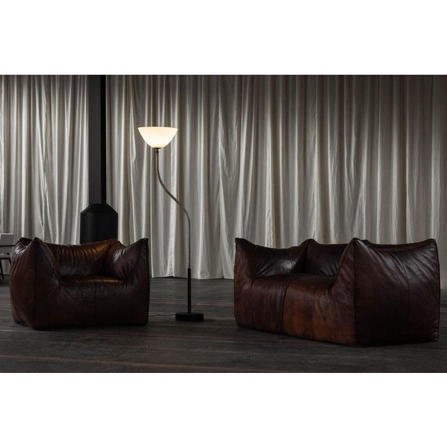 A stunning and rare minimalist floor lamp, model 1051, designed by gino sarfatti and manufactured by arteluce in italy in...