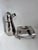 A silver cocktail shaker — penguin — with a rubber cork and chain and the base — both have the mark/signature on the...