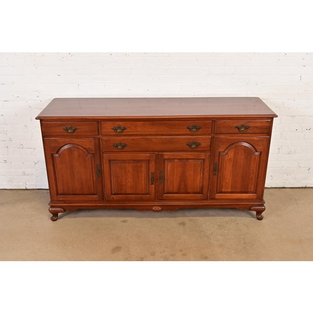 A gorgeous American Colonial, Early American, or Chippendale style sideboard, credenza, or bar cabinet By Ethan Allen USA,...