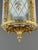 Elegant Louis XVI style gilt bronze lantern, finely chased with neoclassical motifs, ribbons, and acanthus leaves. It is...