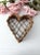 This is a vintage twig heart basket. Shaped as a heart, the open weave base cottage basket has a rustic twig frame with...
