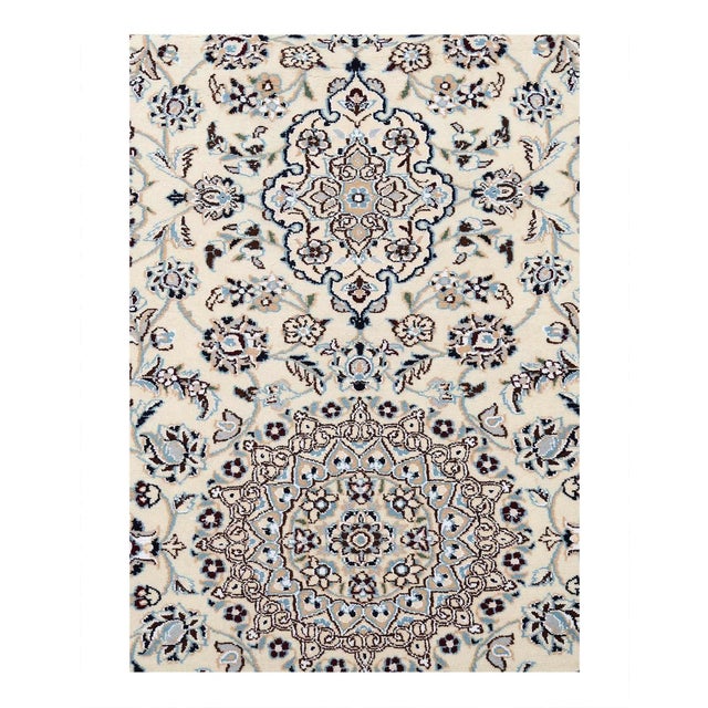 Beautiful hand-knotted Nain rug made from wool and silk. Nain is a small village located in central Persia that has...