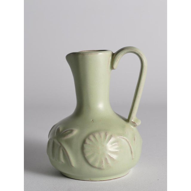 Anna-lisa thomson for upsala ekeby celadon green relief vase, sweden 1944–1953 a charming and sculptural celadon green...
