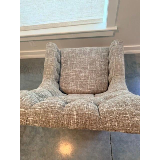 Classic Lee Industries tufted armchair featuring timeless English-inspired styling. This chair features a gracefully...