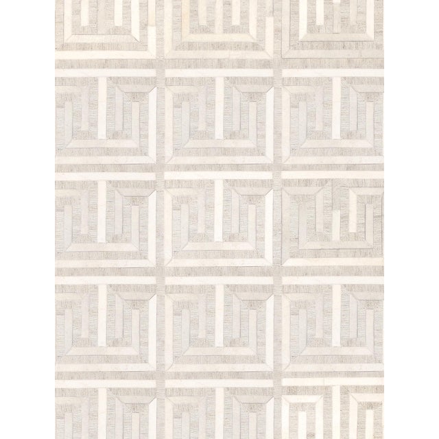 The Galaxy Collection provides a fresh take on classic geometric design. Hand-stitched by skilled artisans. These rugs are...