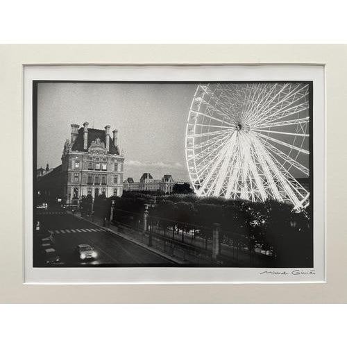 Michel Giniès The Ferris Wheel at the Tuileries Format: 30 x 40 cm Silver print Sign This piece is attributed to the...