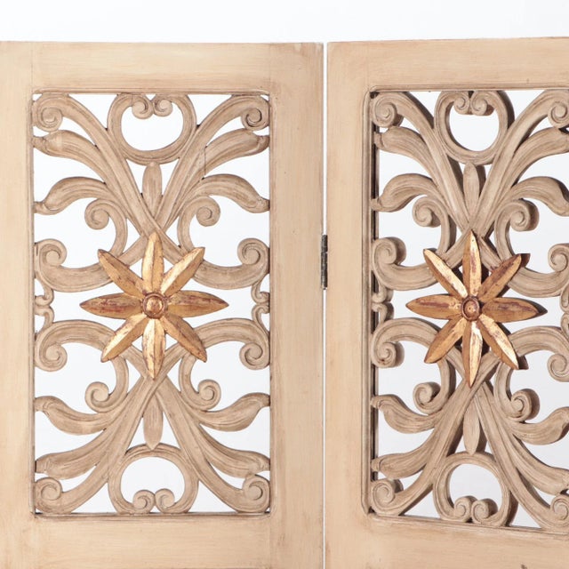 A Mid Century Modern four panel painted and gilt wood fantasy room divider. C 1950