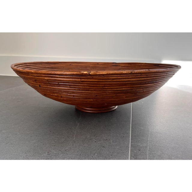 Vintage mid century modern pencil reed bowl. This bowl is very large with a cute footed detail. Perfect for displaying...